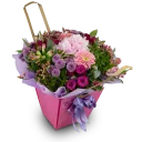Bouquet of hydrangeas and germini in water packaging